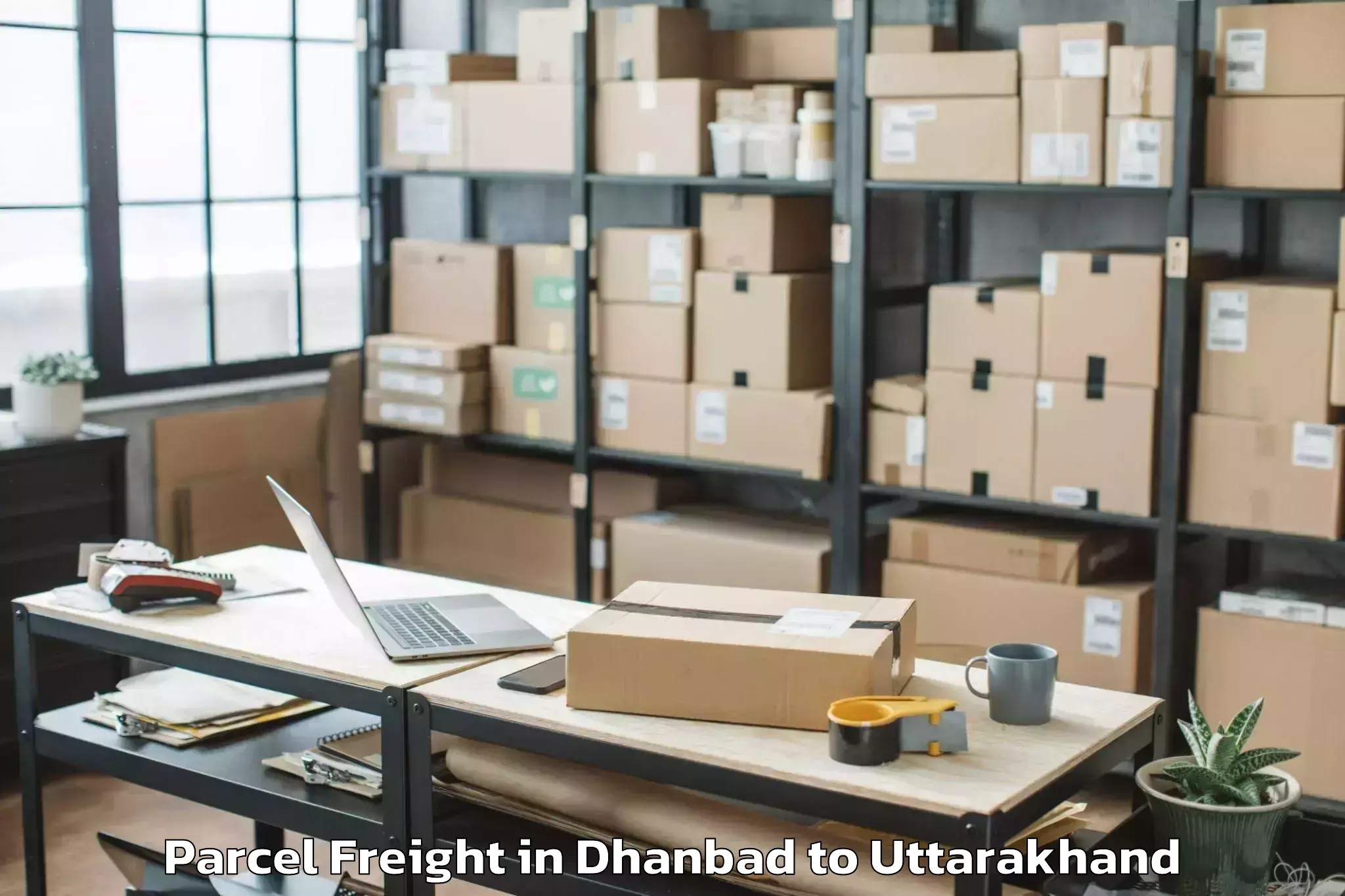 Book Your Dhanbad to Dhanaulti Parcel Freight Today